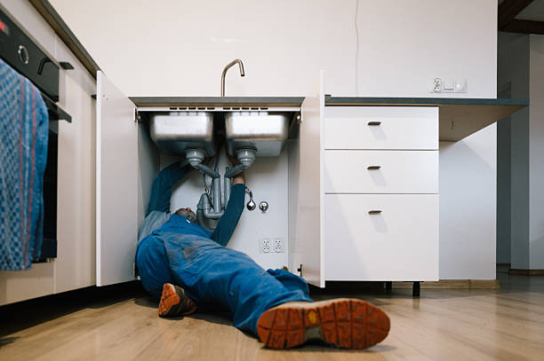 Professional Plumbing technician working in Devens, MA